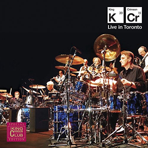 King Crimson live concert album cover featuring a drummer and band onstage.