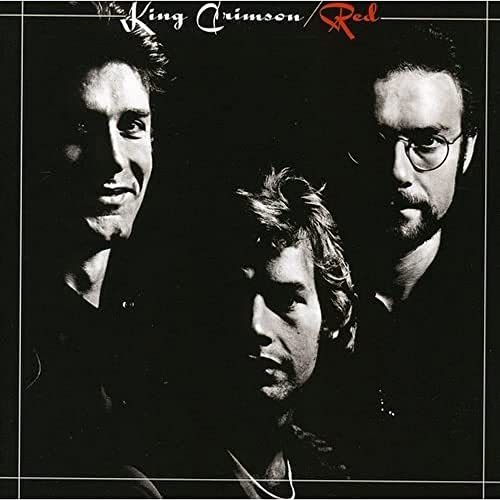 Black and white portrait of three men, album cover for King Crimson’s “Red”.