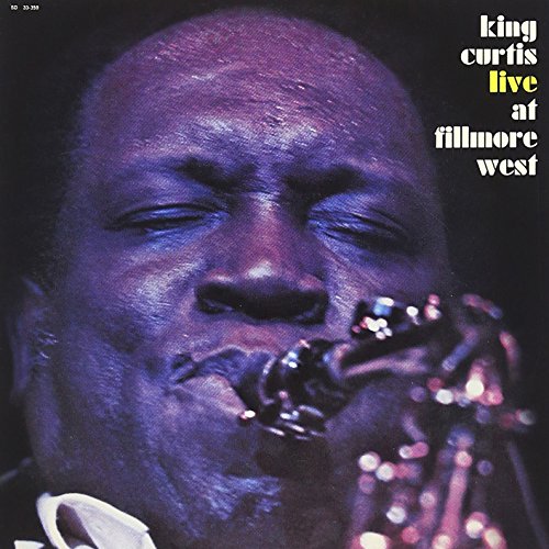 Close-up of King Curtis playing saxophone, album cover for "Live at Fillmore West".