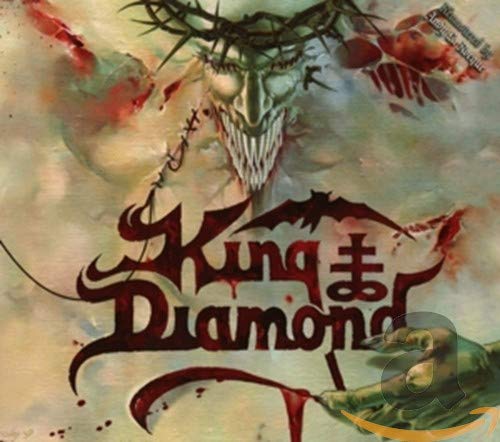 King Diamond album cover: demonic figure with thorns and blood-splattered text.