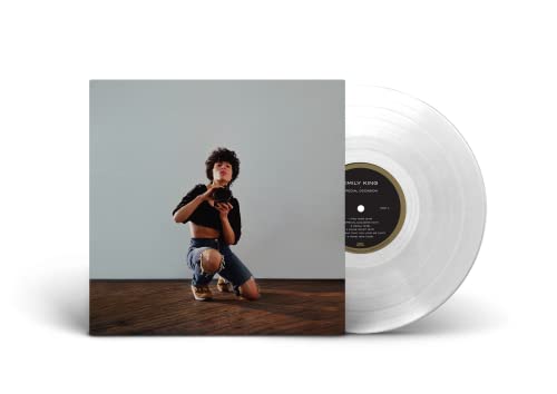 Clear vinyl record with album cover featuring a kneeling person.