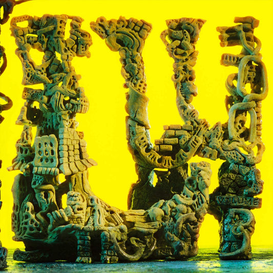 Yellow background with a detailed, sculpted tower resembling the letters "L.W.".