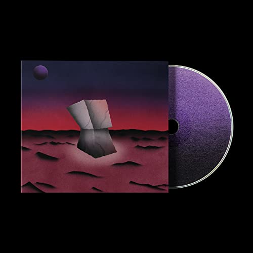 King Krule “Space Heavy” CD cover with abstract landscape and disc.