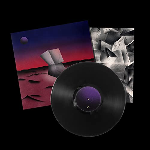 King Krule "Space Heavy" vinyl record with abstract desert cover art.