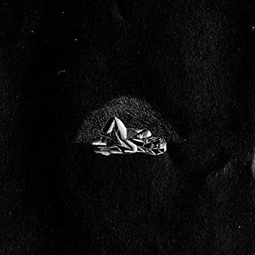 Black and white album cover depicting a person lying on textured ground.