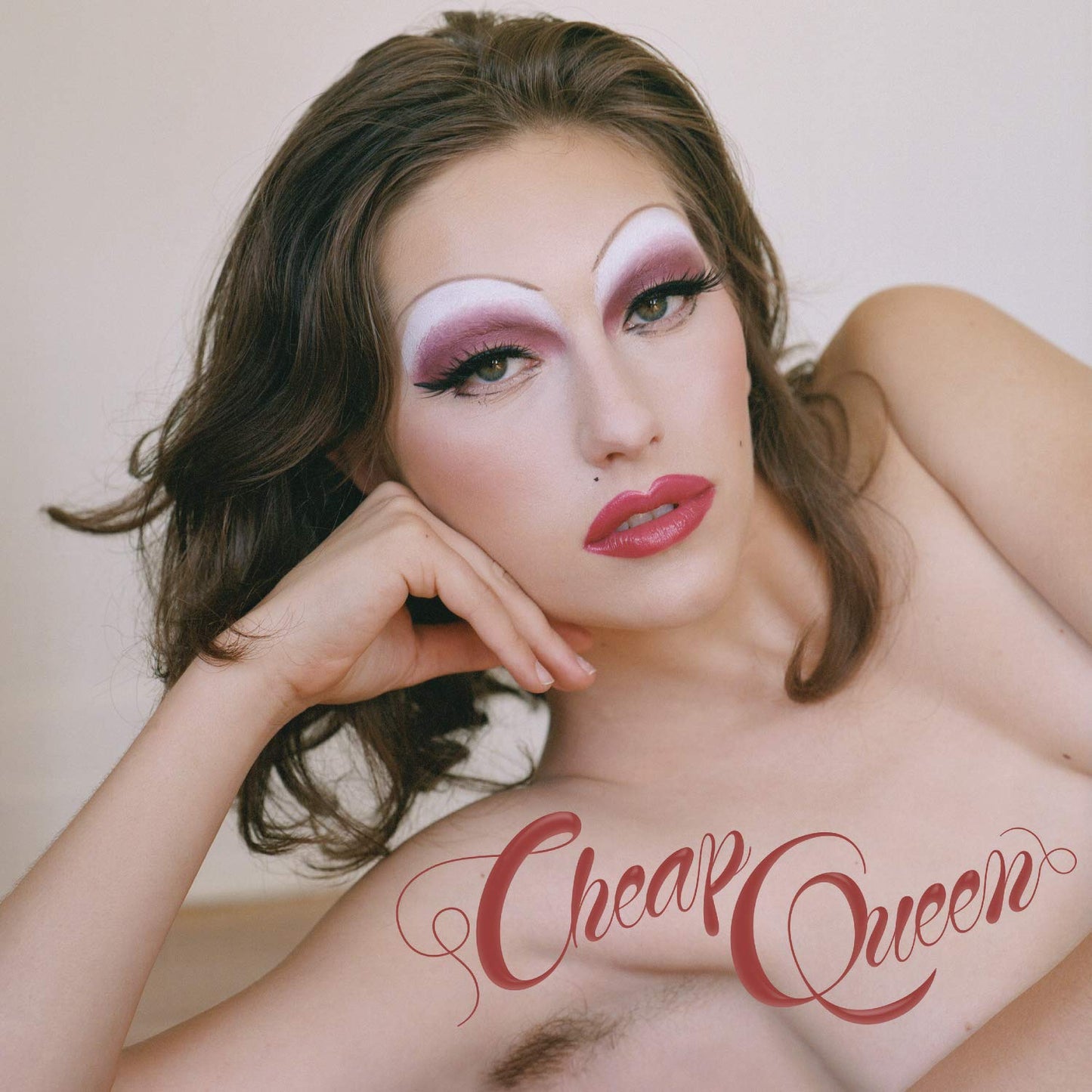 Album cover of "Cheap Queen" by King Princess, featuring a topless woman with heavy makeup.