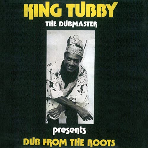 Album cover for King Tubby’s “Dub From The Roots” featuring his portrait.
