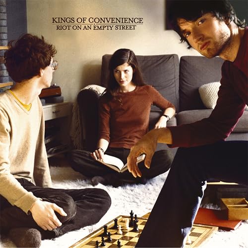 Album cover for Kings of Convenience’s “Riot On An Empty Street” featuring three people.