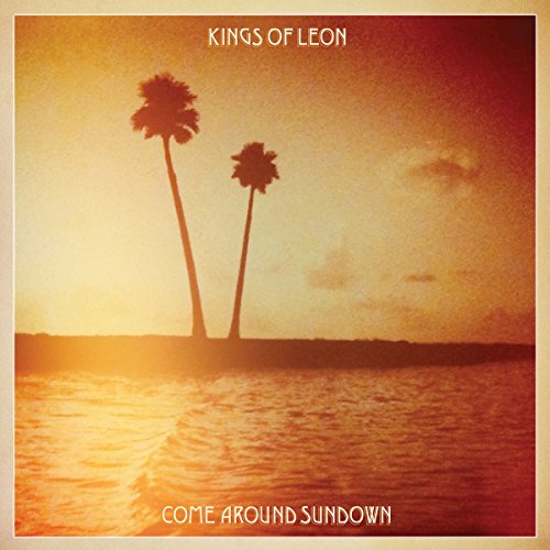Album cover featuring two palm trees silhouetted against a golden sunset over water.