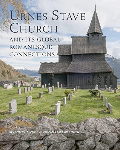 Dark wooden Urnes Stave Church with a steepled roof and surrounding graveyard.
