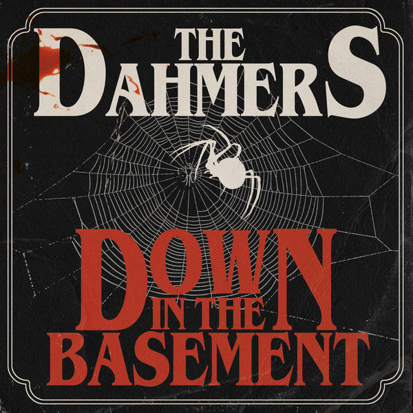 Album cover for "Down in the Basement" with a spiderweb and skull.