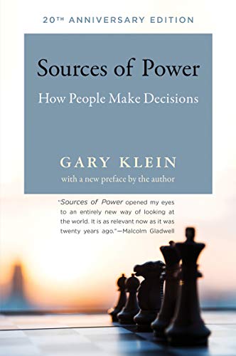 Book cover: “Sources of Power” with chess pieces in foreground.