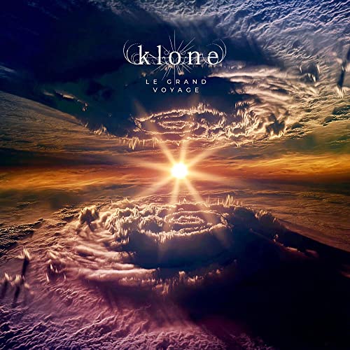 Album cover for Klone’s “Le Grand Voyage” featuring a swirling, sunlit landscape.