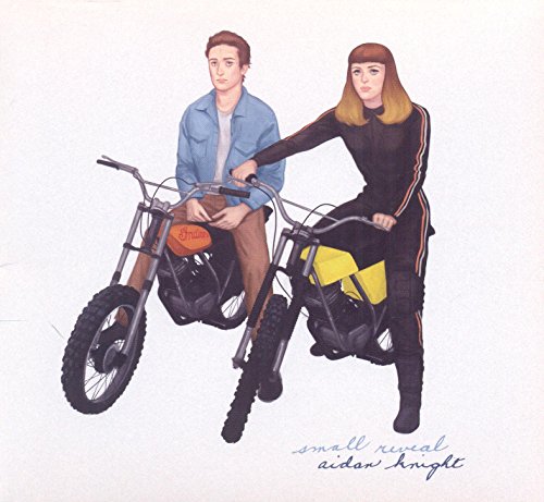 The image is a CD cover featuring a man and woman on motorcycles.