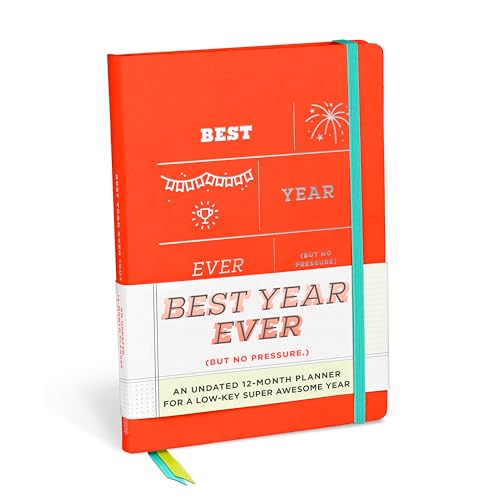 Red and white hardcover planner with "Best Year Ever" text and teal ribbon.