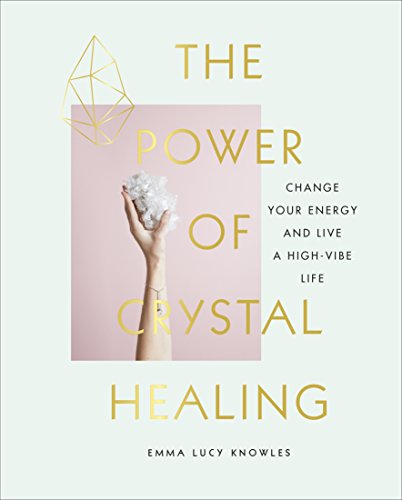 Book cover with hand holding crystals and gold geometric shapes.