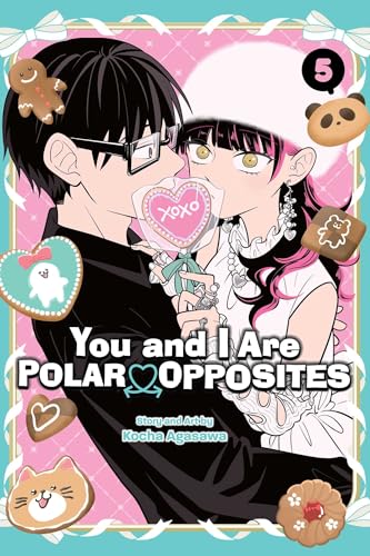 Manga cover featuring a couple holding a heart-shaped lollipop surrounded by various cookie illustrations.