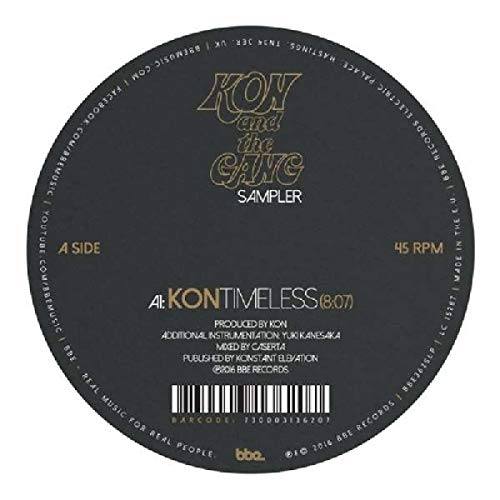Black vinyl record with gold and white text, featuring a barcode at the bottom.