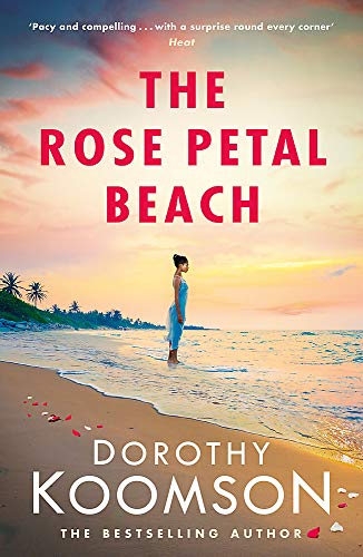 Book cover: woman on beach with rose petals, sunset sky.