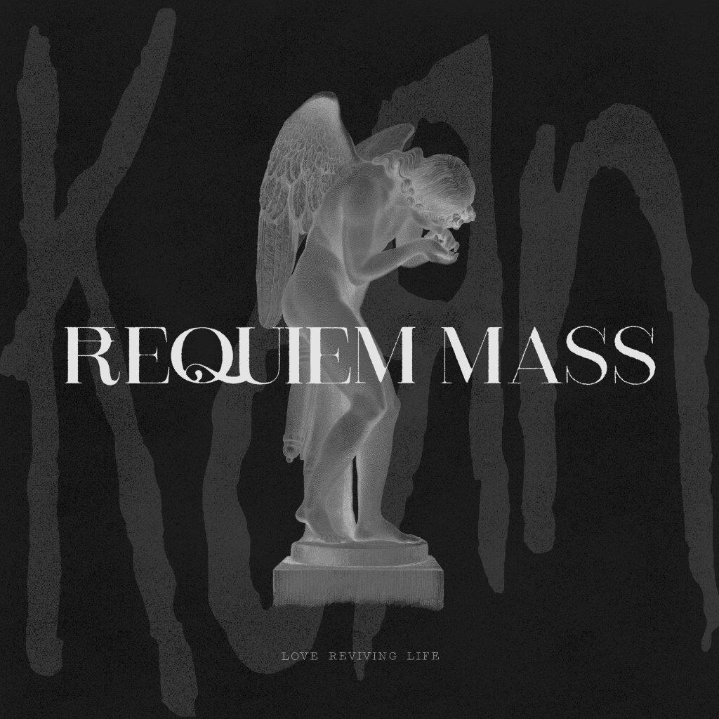 "Album cover for Korn - Requiem Mass, featuring a gray angel statue on black background."