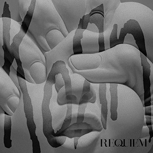 Black and white album cover for Korn’s “Requiem” with distorted faces.