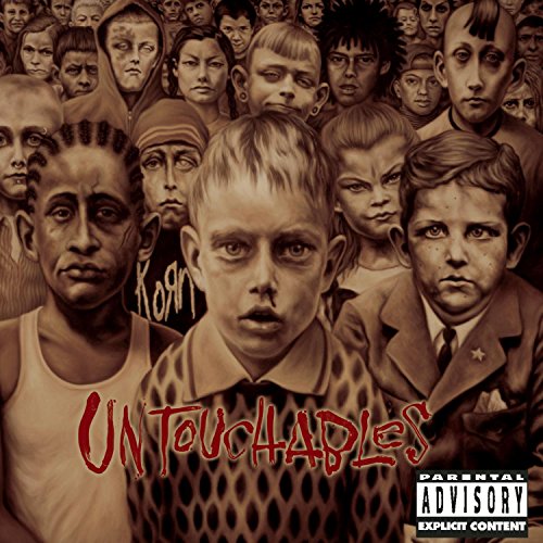 Korn’s “Untouchables” album cover: a group of distressed children’s portraits.