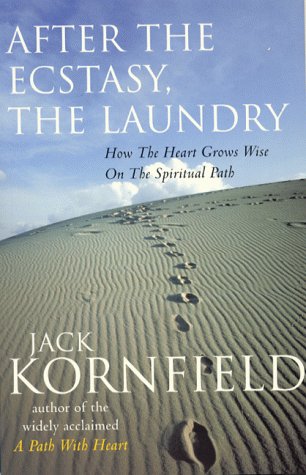 Book cover showing footprints leading across a sandy dune under a blue sky.