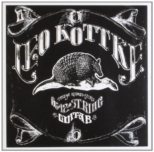 Black and white album cover with ornate lettering and an armadillo.