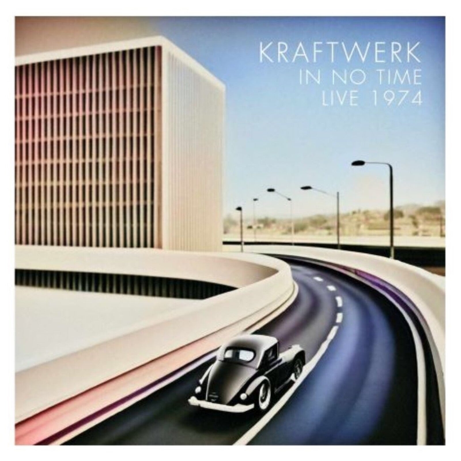 A vintage car drives on a curved road beside a modern building under blue sky.