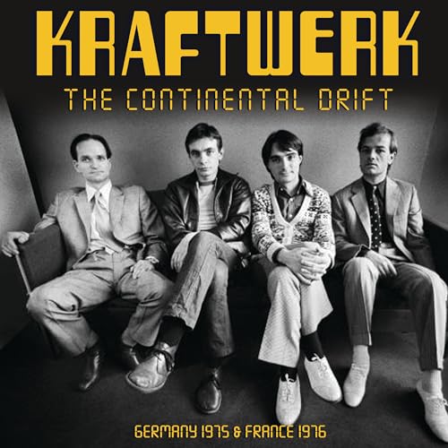 Kraftwerk album cover featuring four men in suits seated together.