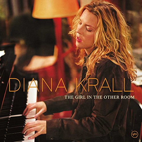 Diana Krall at a piano, album cover for “The Girl In The Other Room.”