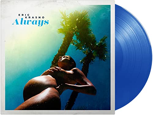 Blue vinyl record with album cover featuring a woman and palm trees.