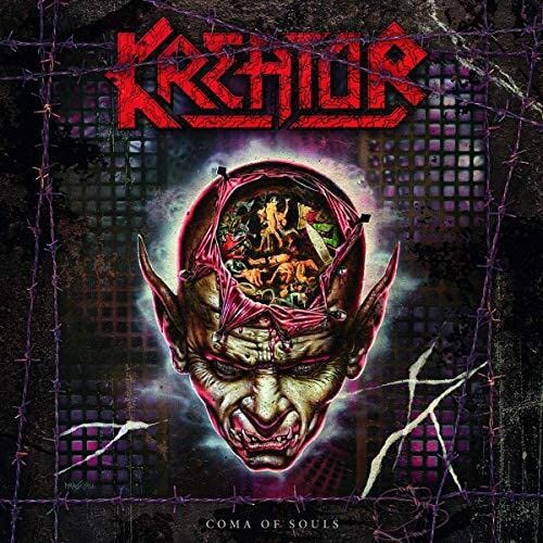 Kreator album cover: demonic head with a city scene inside, barbed wire.