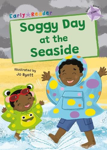 Children in raincoats play on a beach with waves and grey skies.