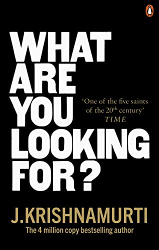 Book cover with white title text on black background, author name J. Krishnamurti below.