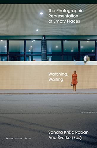 Book cover: woman standing before a building with blank walls.