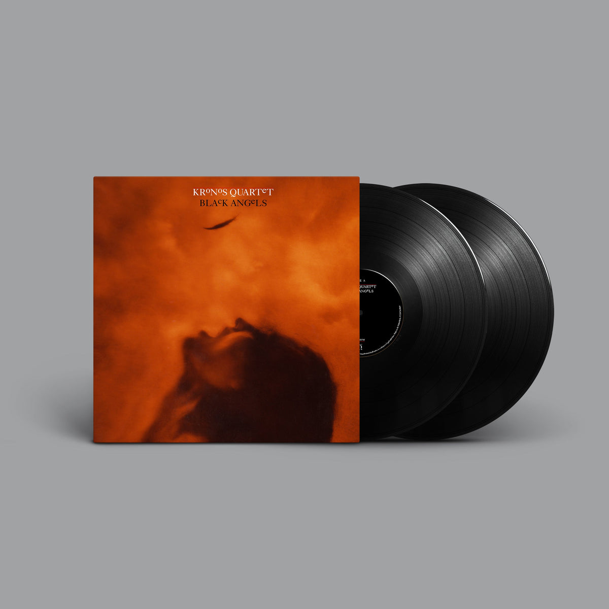 Kronos Quartet "Black Angels" vinyl record with orange and black cover.