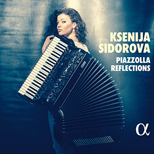 Ksenija Sidorova with a black accordion, album cover for "Piazzolla Reflections".