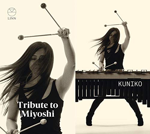 CD cover: percussionist Kuniko, holding mallets above a marimba.