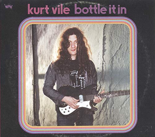 Kurt Vile album cover: a portrait of a man with a guitar.