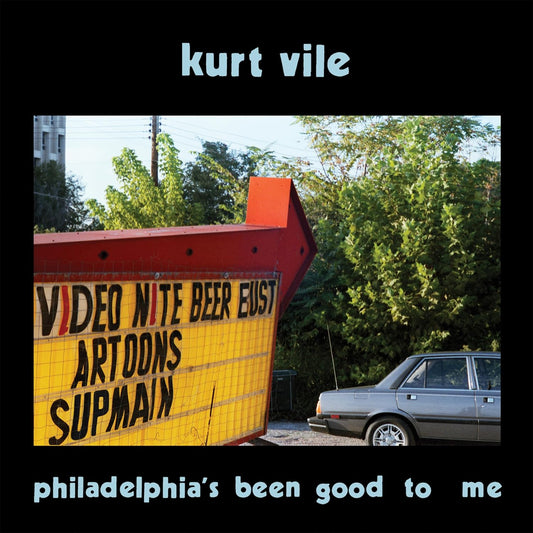 Kurt Vile CD case showing a yellow sign and a car with the disc.