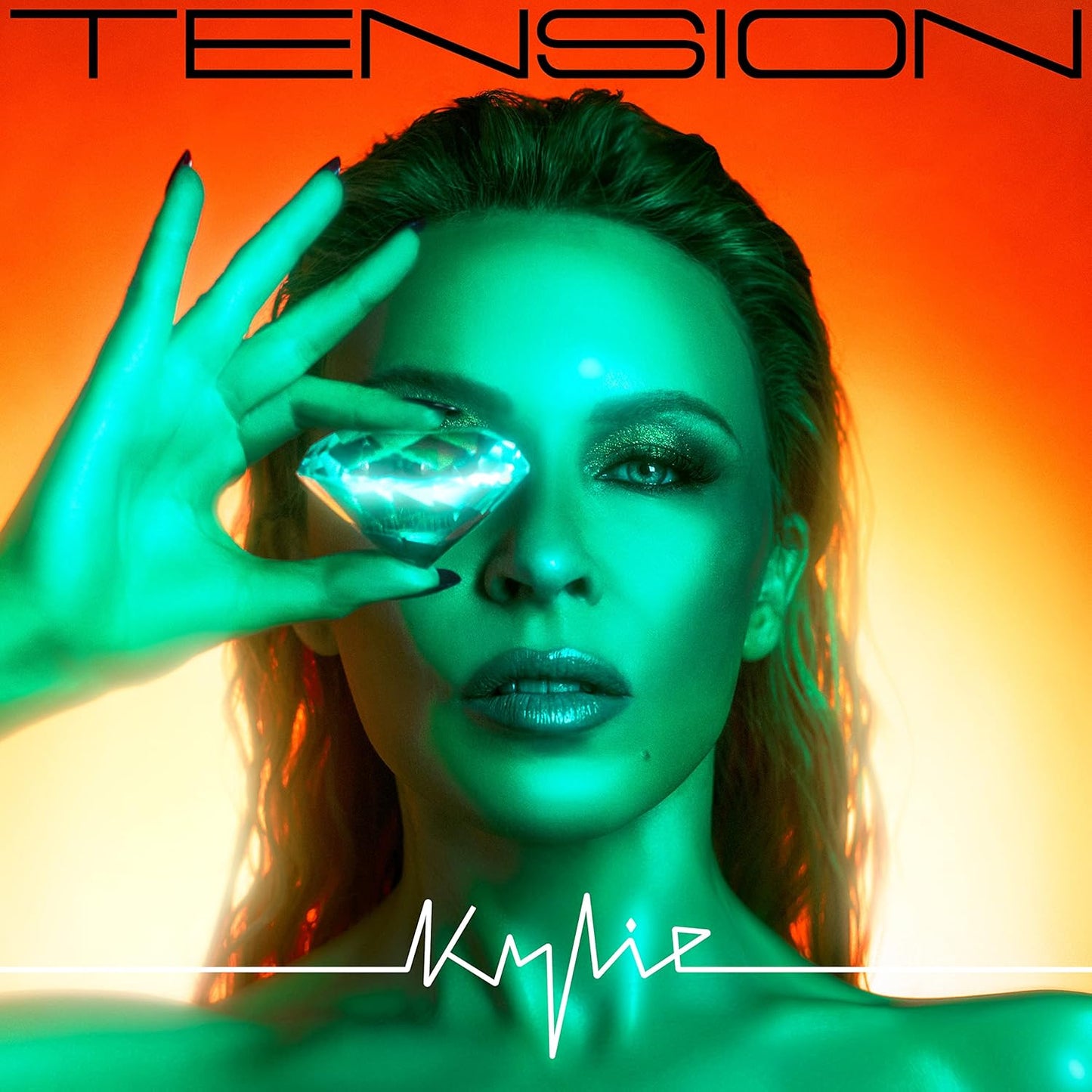 "Black vinyl record with green label, sleeve featuring Kylie Minogue's face and 'TENSION' title."