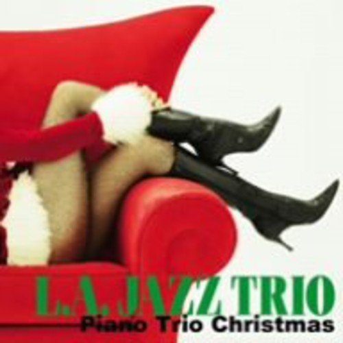 CD cover with legs in boots and Santa hat on a red couch.
