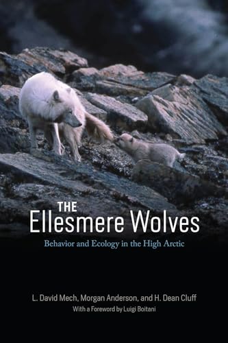 Book cover featuring two Arctic wolves on rocky terrain.