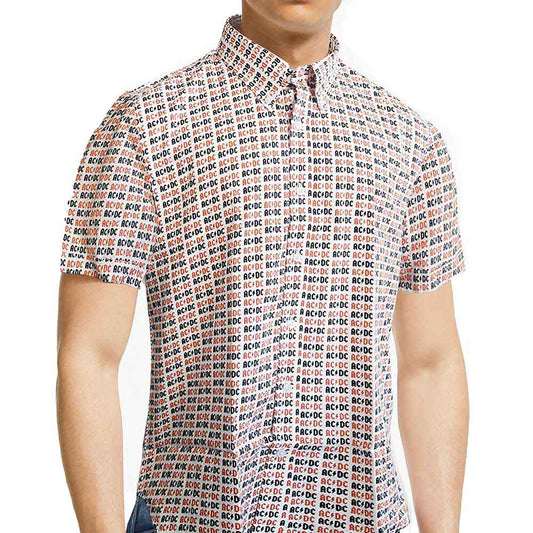 Man wearing a white short-sleeved shirt with a repeating logo pattern.