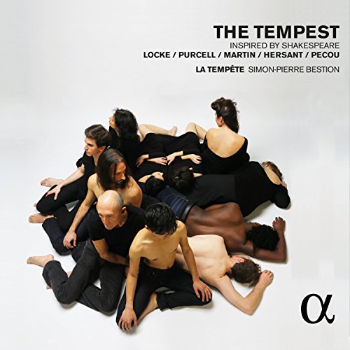 CD cover: group of people in dark clothing, abstract pose.