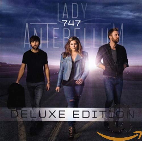 Lady Antebellum's "747" CD cover featuring the band members against a sky background.
