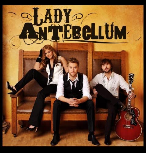 Album cover featuring three members of Lady Antebellum sitting on a wooden bench.