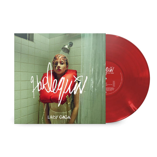 Lady Gaga in a shower wearing a life vest, next to a red vinyl record.