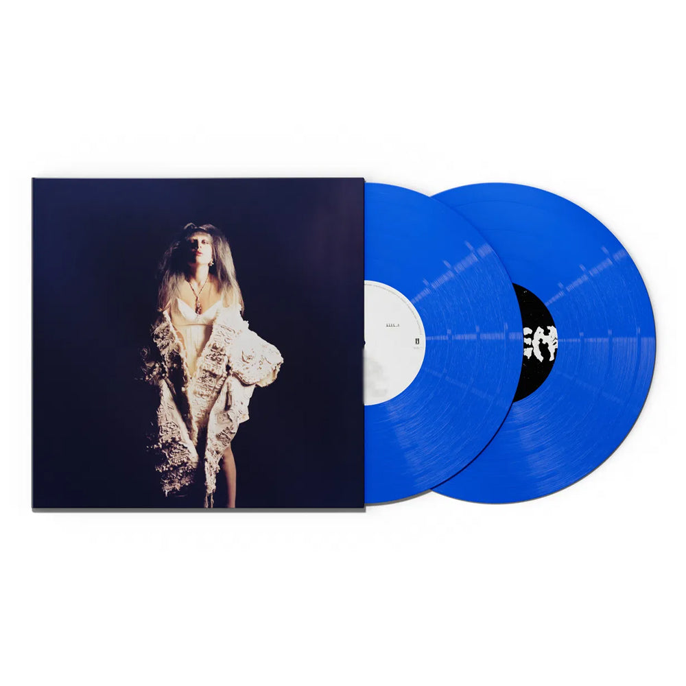 Lady Gaga album cover and two bright blue vinyl records.